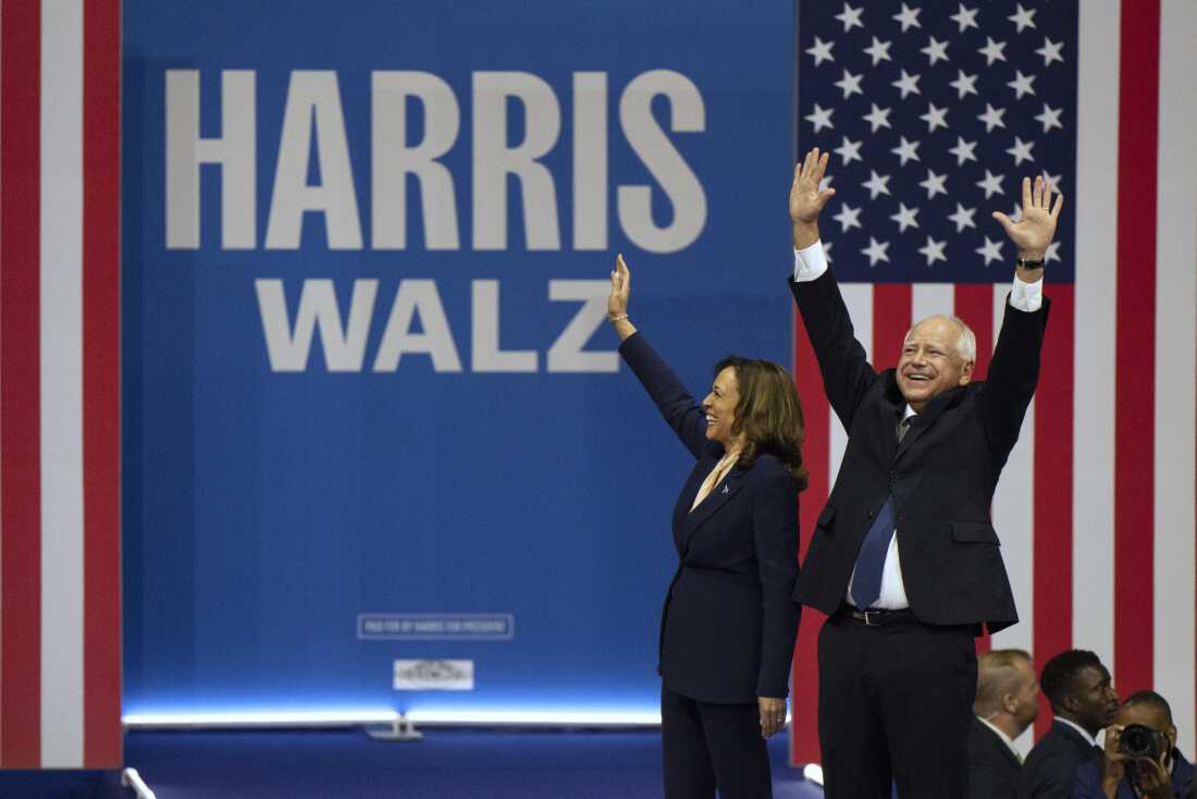 Vice President Harris, the Democratic presidential nominee, and her running mate, Minnesota Gov. Tim Walz, arrive for a campaign rally in Philadelphia Tuesday.