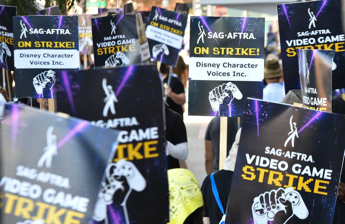 Striking performers picket outside Disney Character Voices, a subsidiary of The Walt Disney Company, in Burbank, California, in August.