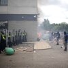 Riot police clashed with anti-immigration protesters outside of a Holiday Inn Express, which is used to house asylum seekers, in Rotherham, United Kingdom, on Sunday.
