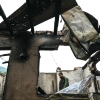 A man stands inside his house destroyed by Pakistani artillery shelling at the Salamabad village in Uri, about 110kms from Srinagar, on May 8, 2025. India's government said on May 8 that Pakistan launched an overnight air attack using "drones and missiles", before New Delhi retaliated to destroy an air defence system in Lahore. "Pakistan attempted to engage a number of military targets ... using drones and missiles," India's defence ministry said in a statement, adding that "these were neutralised" by air defence systems. (Photo by Sajjad HUSSAIN / AFP) (Photo by SAJJAD HUSSAIN/AFP via Getty Images)