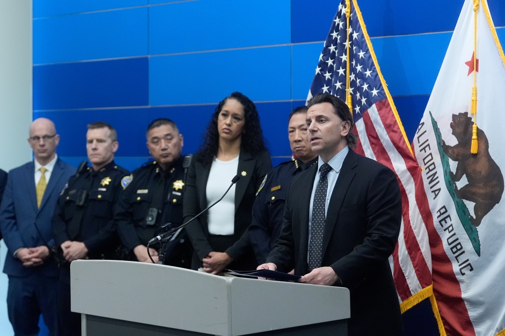 Matt Cobo, F.B.I. San Francisco Acting Special Agent in Charge ( right) speaks next to San Francisco Police Chief Derrick Lew (second from right) and San Francisco District Attorney Brooke Jenkins (third from right) during a news conference Monday, April 13, 2026, in San Francisco. (AP)