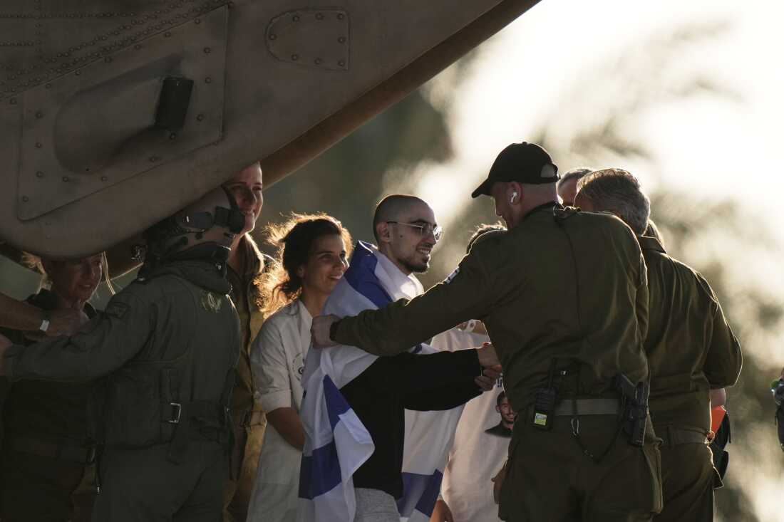 Rom Breslavski, an Israeli hostage released from the Gaza Strip walks off a helicopter at the Sheba Medical Center in Ramat Gan, Israel, Monday, Oct. 13, 2025. (AP Photo/Leo Correa)