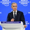 Canada's Prime Minister Mark Carney delivers a speech during the World Economic Forum (WEF) annual meeting in Davos on January 20, 2026.
