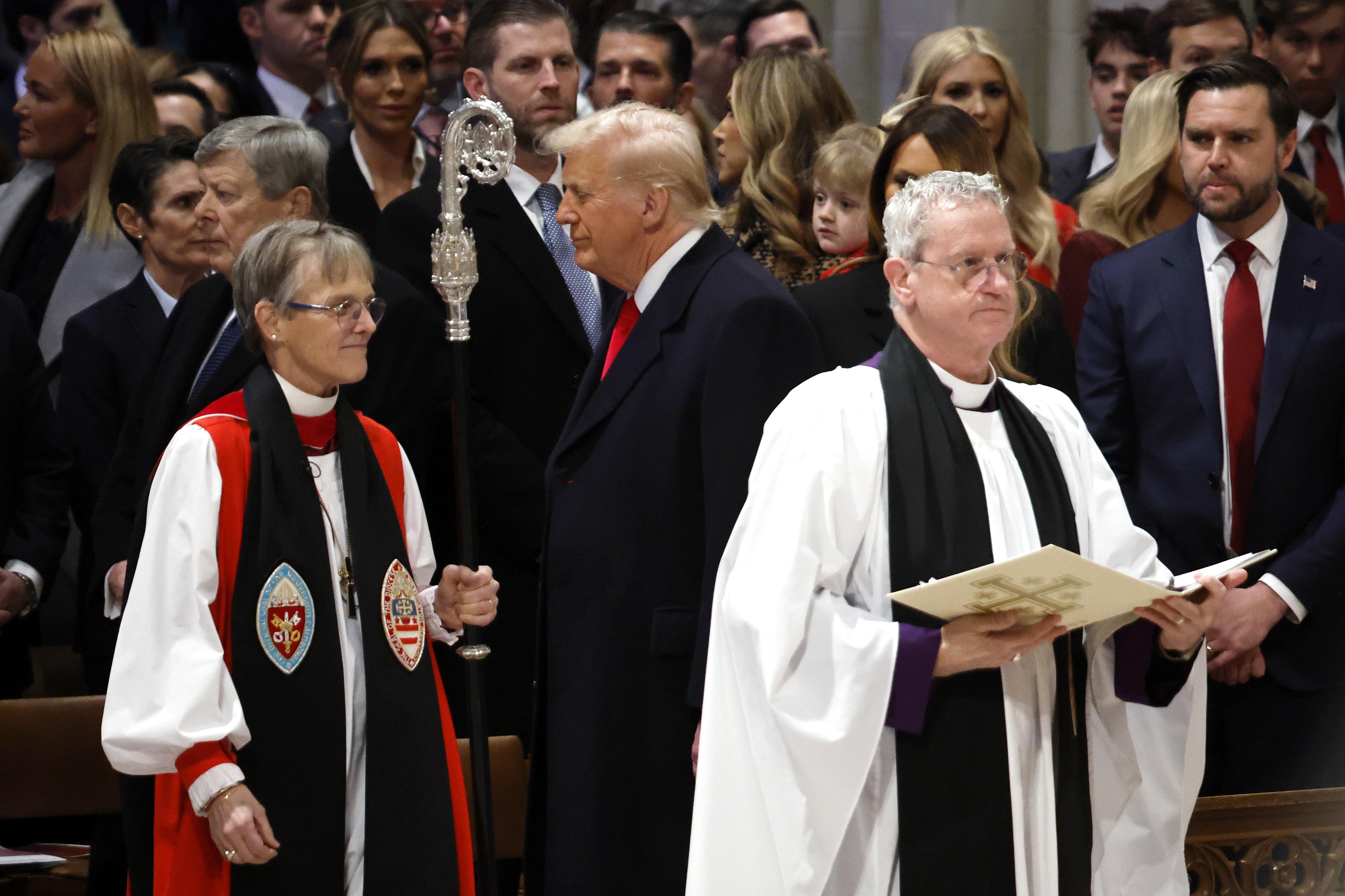 Bishop Mariann Edgar Budde arrives as President Donald Trump and Vice President J.D. Vance look on during the Service of Prayer for the Nation Prayer Service at Washington National Cathedral on Tuesday.