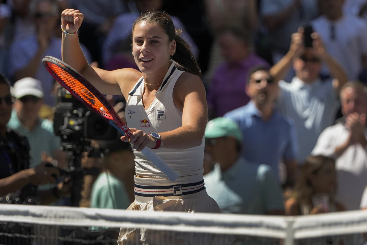 Emma Navarro reacts after defeating Paula Badosa, of Spain, during the quarterfinals of the U.S. Open tennis championships, Tuesday, Sept. 3, 2024, in New York.