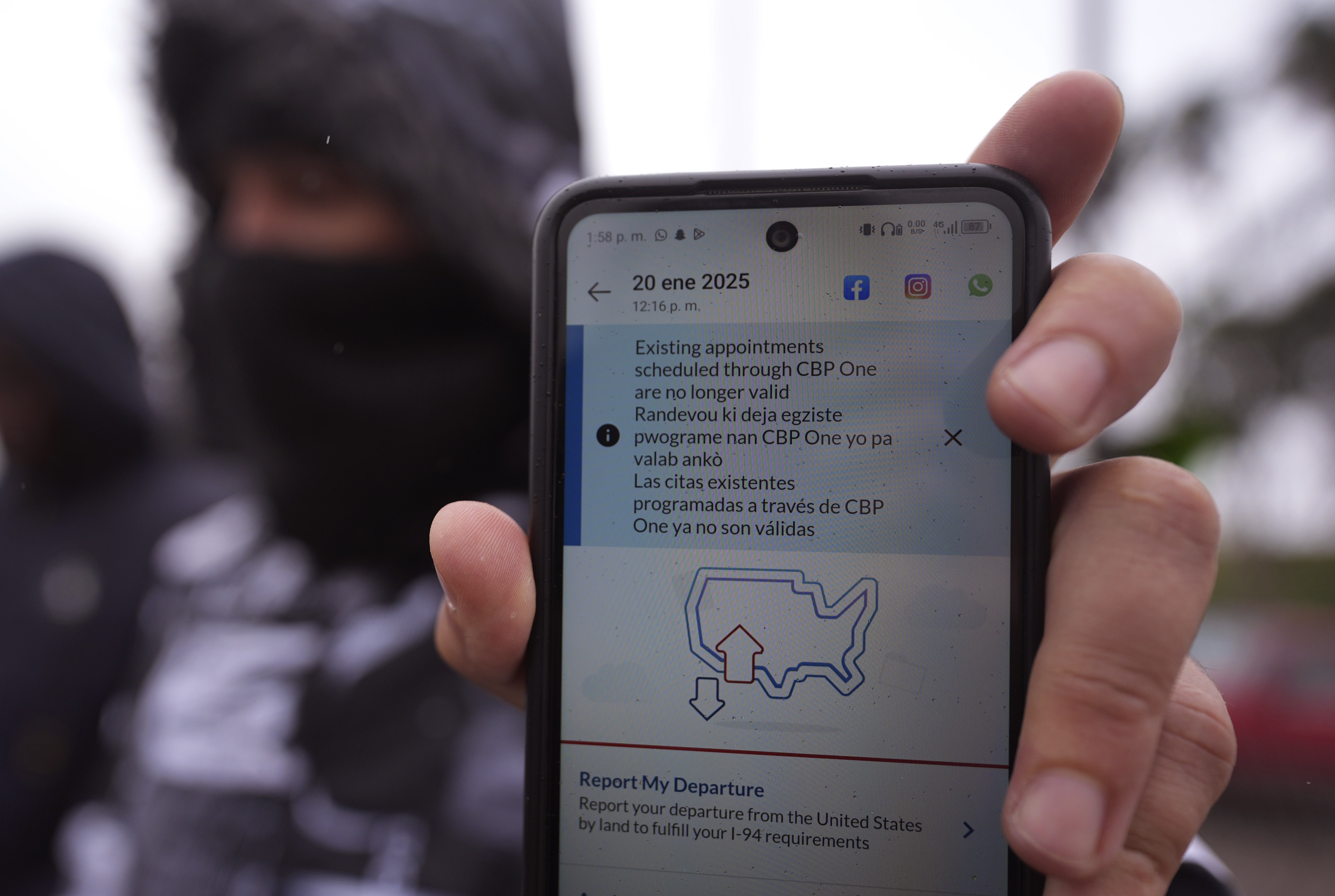 A migrant in Matamoros, Mexico, seeking asylum in the U.S. holds up the CBP One app showing his appointment was canceled after President Donald Trump was sworn into office, Jan. 20, 2025. A federal judge Wednesday struck down Trump's suspension of asylum claims at the southern border. (AP)