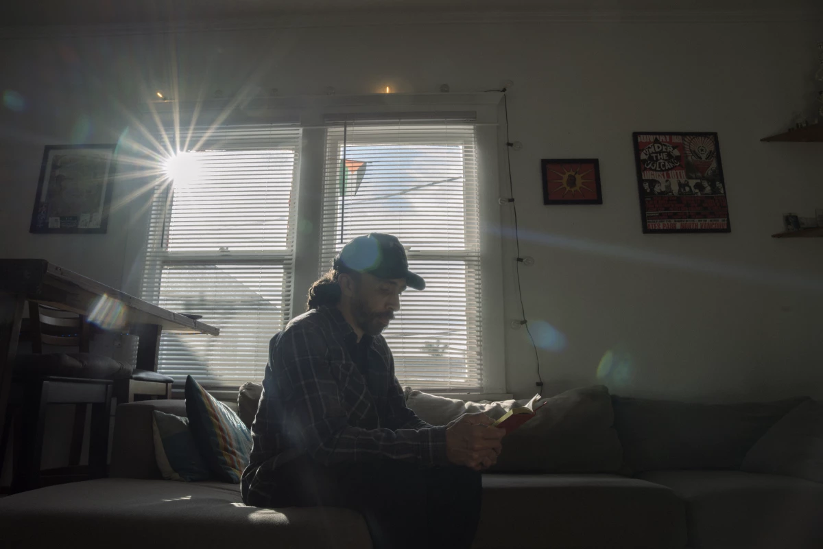 Sherman Austin, whose Instagram account information was subpoenaed by DHS for posting anti-ICE content, poses for a portrait in his home on March 1.