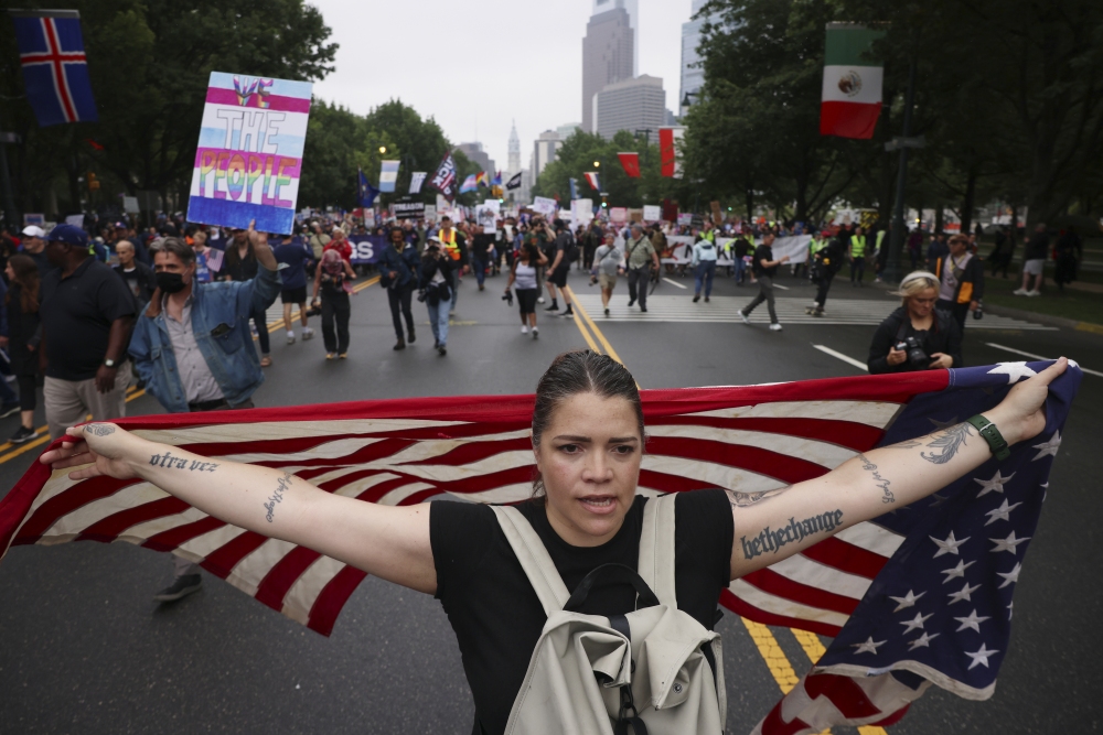 Demonstrators march down Benjamin Franklin Parkway during the No Kings protest, Saturday, June 14, 2025, in Philadelphia. (AP)