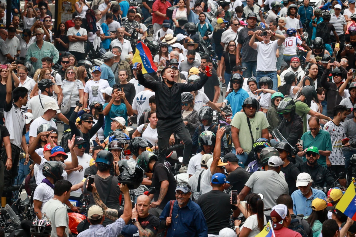 A supporter shouts slogans during a protest against the result of the presidential election on July 30, 2024 in Caracas, Venezuela. President of Venezuela Nicolas Maduro was declared as the winner of the 2024 presidential election over his rival, Edmundo Gonzalez. The result has been questioned by the opposition and internationally.