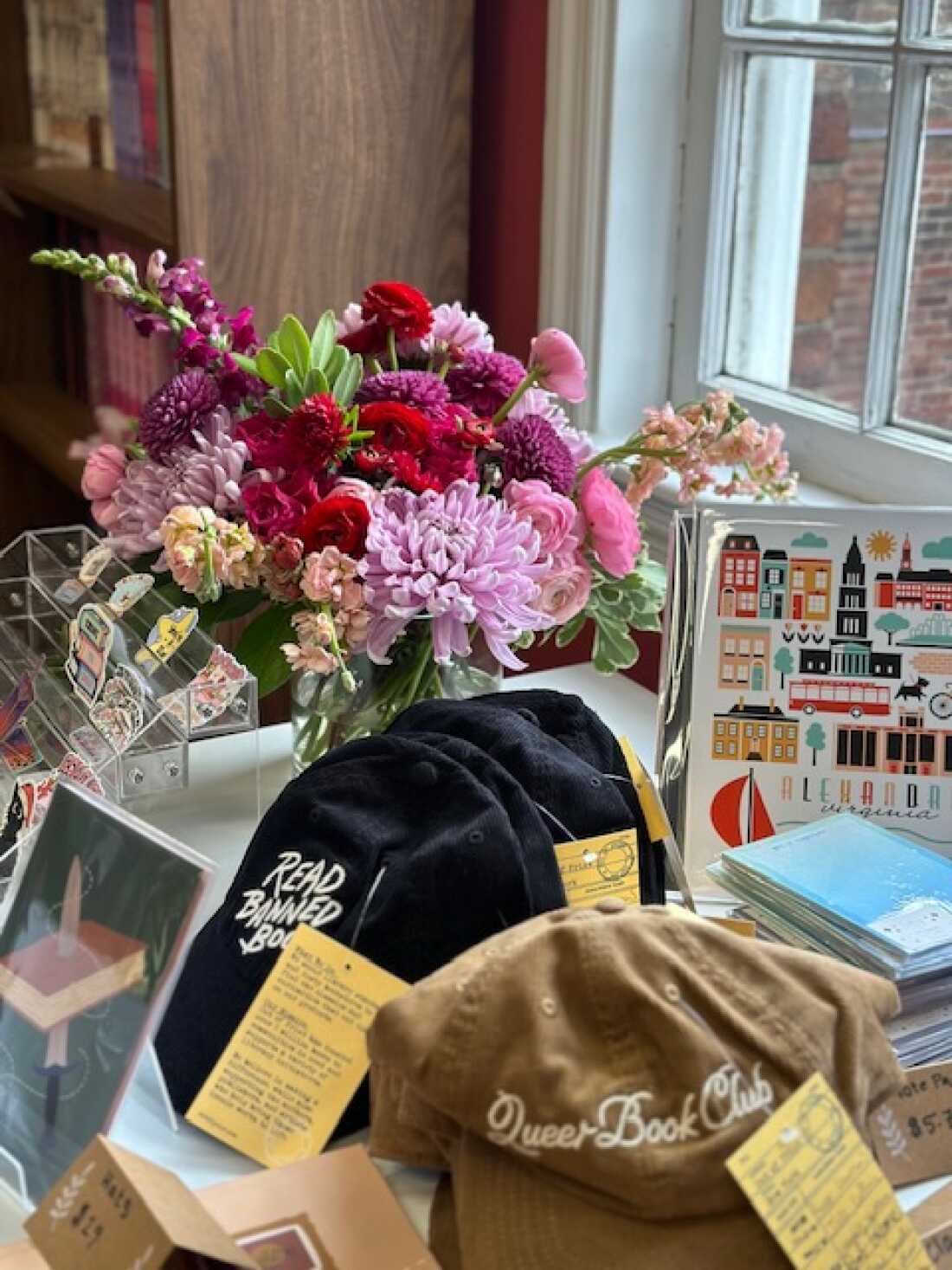 Fortin partnered with women and queer-owned businesses to create merchandise for her bookstore, including hats and stickers.
