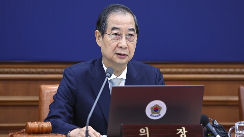 South Korea's Prime Minister Han Duck-soo, who became the country's acting leader after President Yoon Suk Yeol's impeachment, is shown speaking during a cabinet meeting at the government complex in Seoul, South Korea, on Dec. 24, 2024.