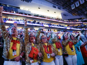 Attendees wear letters that spell out TRUMP on the first day of the 2026 Republican National Convention on Sept. 9, 2026 in Dallas, Texas.