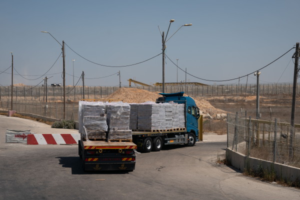 Food and water is stacked and prepared to be loaded on trucks from The Israeli border crossing Kerem Shalom to the Gaza strip on July 10.