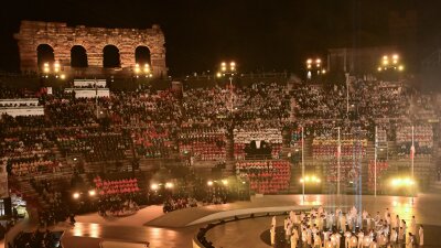 Musicians, choir members and athletes perform during the flag handover portion of the night.