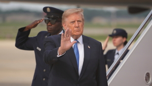 President Trump waves after arriving off Air Force One, Friday, Aug. 28, 2026, at Joint Base Andrews, Md.