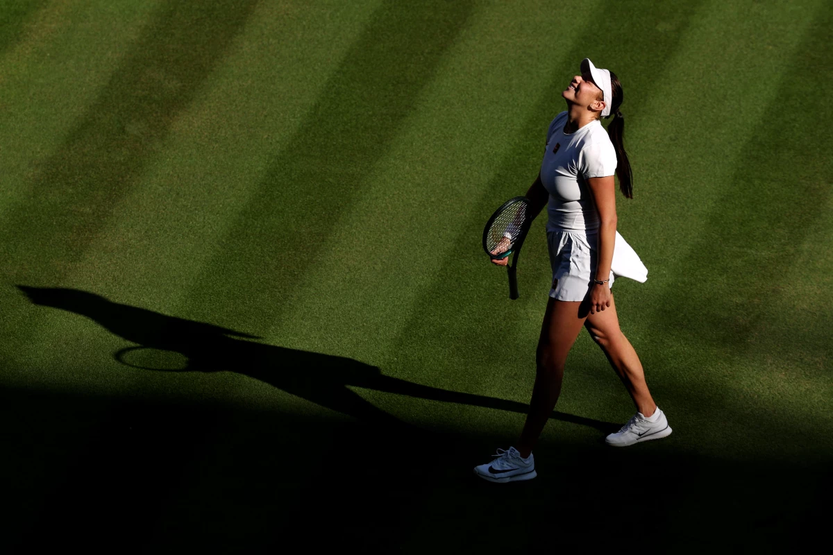 American tennis player Amanda Anisimova celebrates her Wimbledon quarter-final victory against Anastasia Pavlyuchenkova this week at the All England Lawn Tennis & Croquet Club in London.
