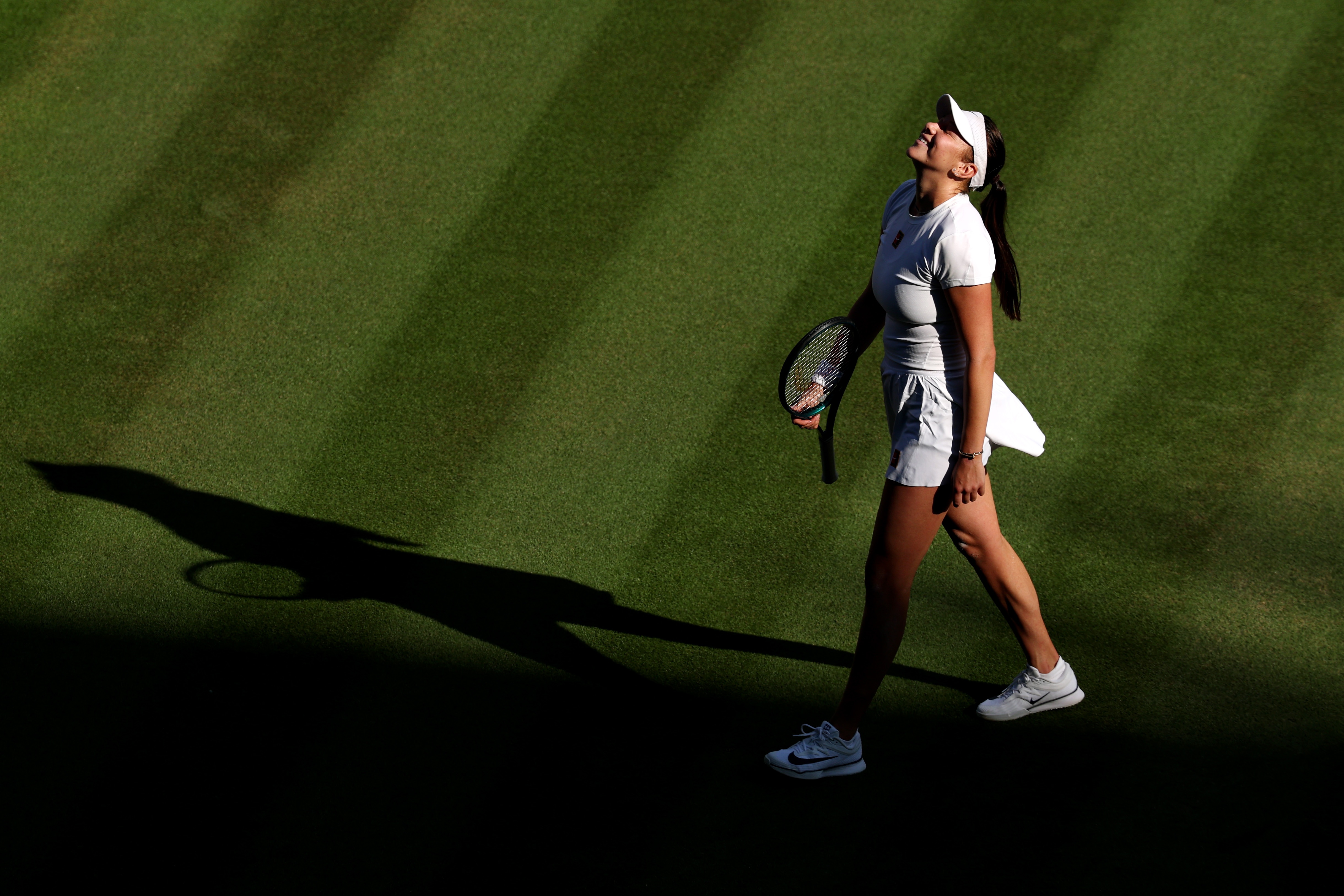 American tennis player Amanda Anisimova celebrates her Wimbledon quarter-final victory against Anastasia Pavlyuchenkova this week at the All England Lawn Tennis & Croquet Club in London.