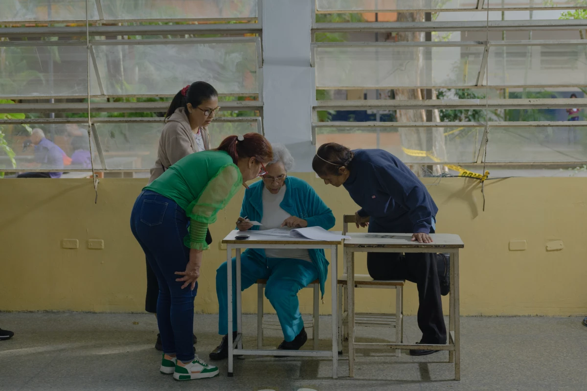 People vote in the Venezuelan presidential elections at the Andrés Bello school in Caracas on Sunday.