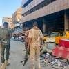 Army soldiers patrol a market area in Khartoum on March 24, 2025. For nearly two years, Sudan has been ravaged by a war between the regular army and the RSF, a conflict that has killed tens of thousands of people, uprooted over 12 million more and created the world's largest hunger and displacement crises.