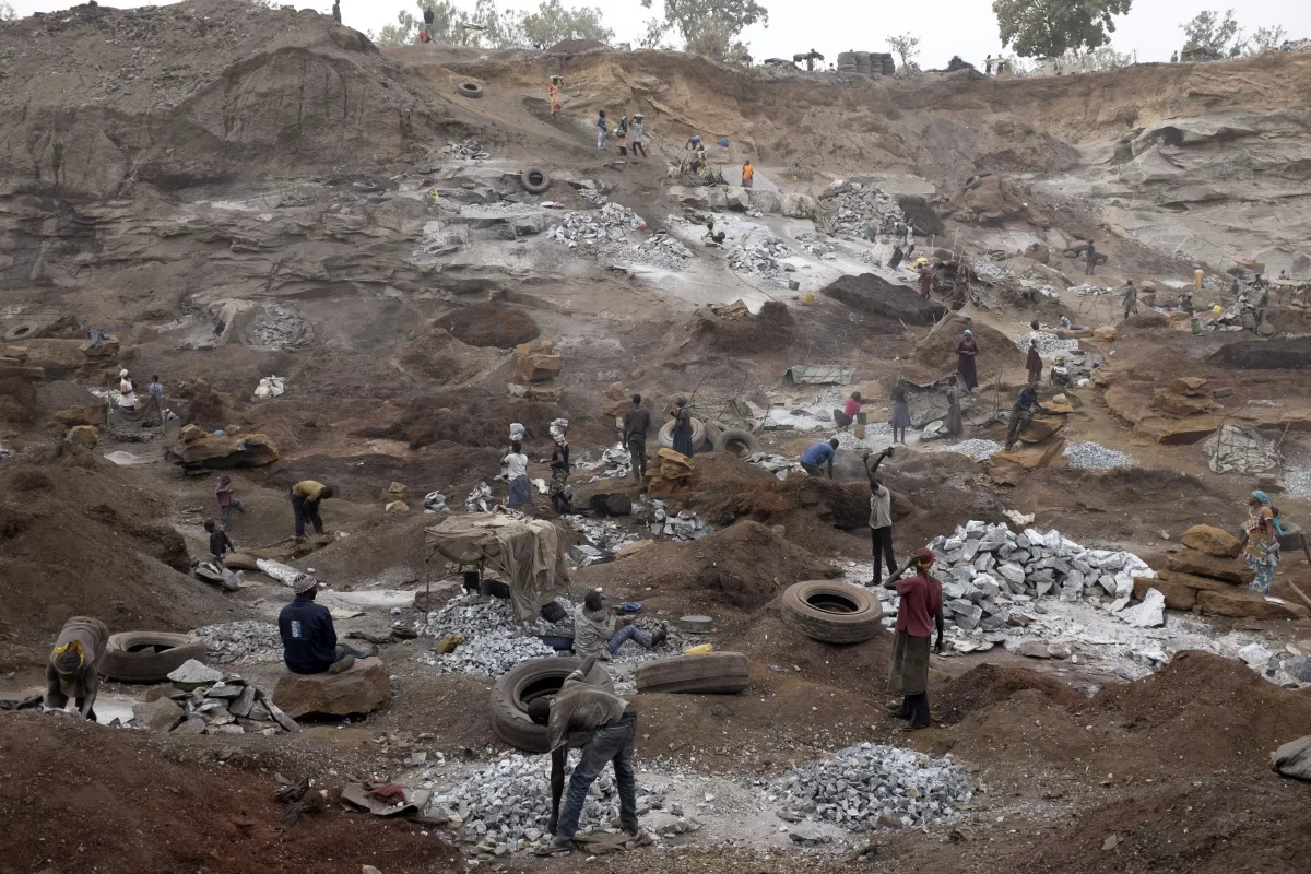 Children work alongside adults in a quarry in Ouagadougou, the largest city in Burkina Faso.