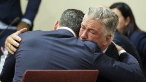 Actor Alec Baldwin hugs his attorney Alex Spiro.