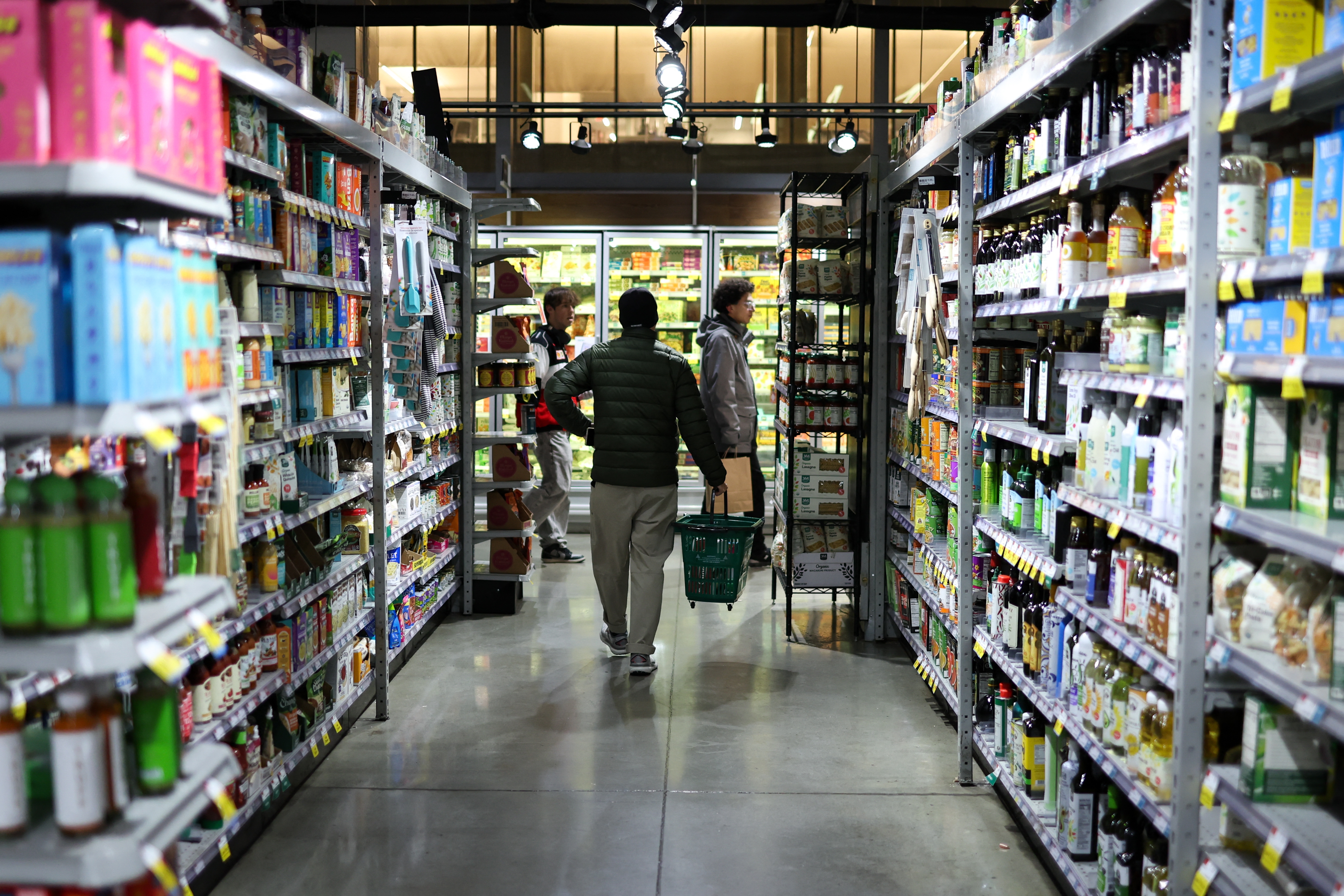 People shop in a supermarket in New York City on Feb. 20, 2025.