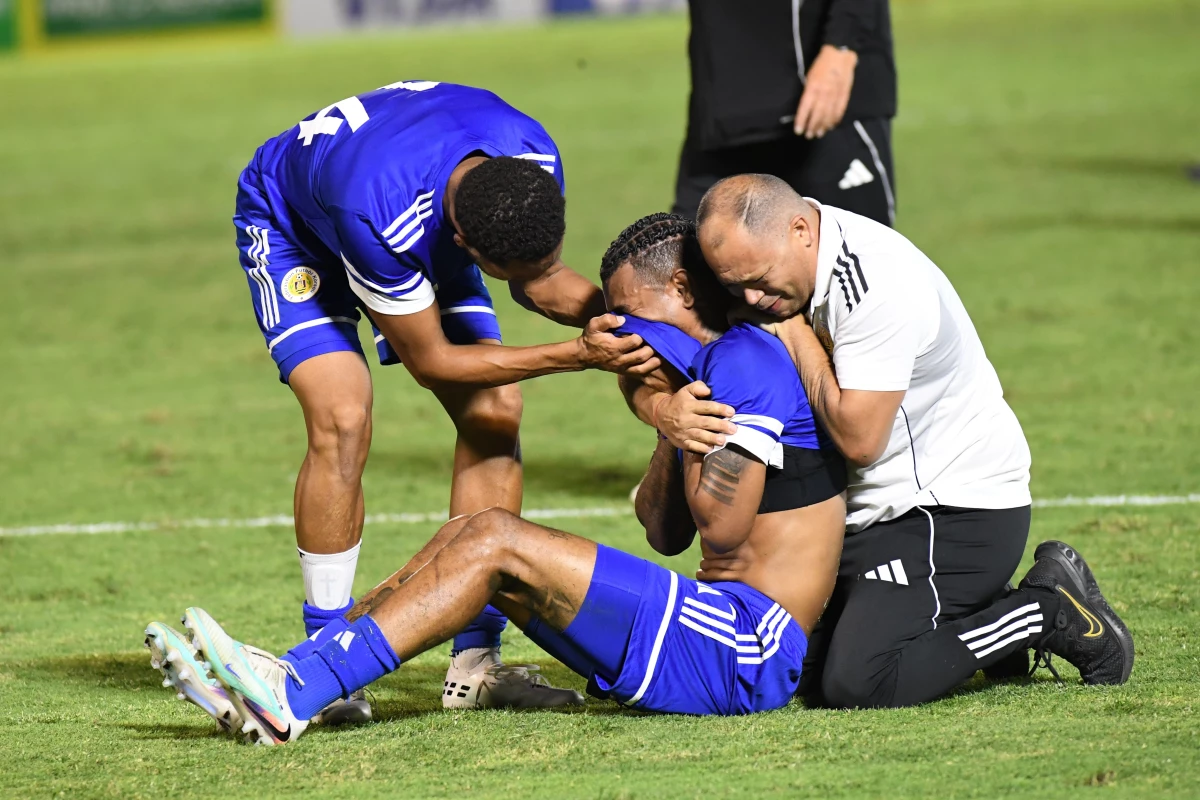 Curacao players celebrate qualifying for the 2026 FIFA World Cup after their game with Jamaica in Kingston, Jamaica, Tuesday, Nov. 18, 2025.