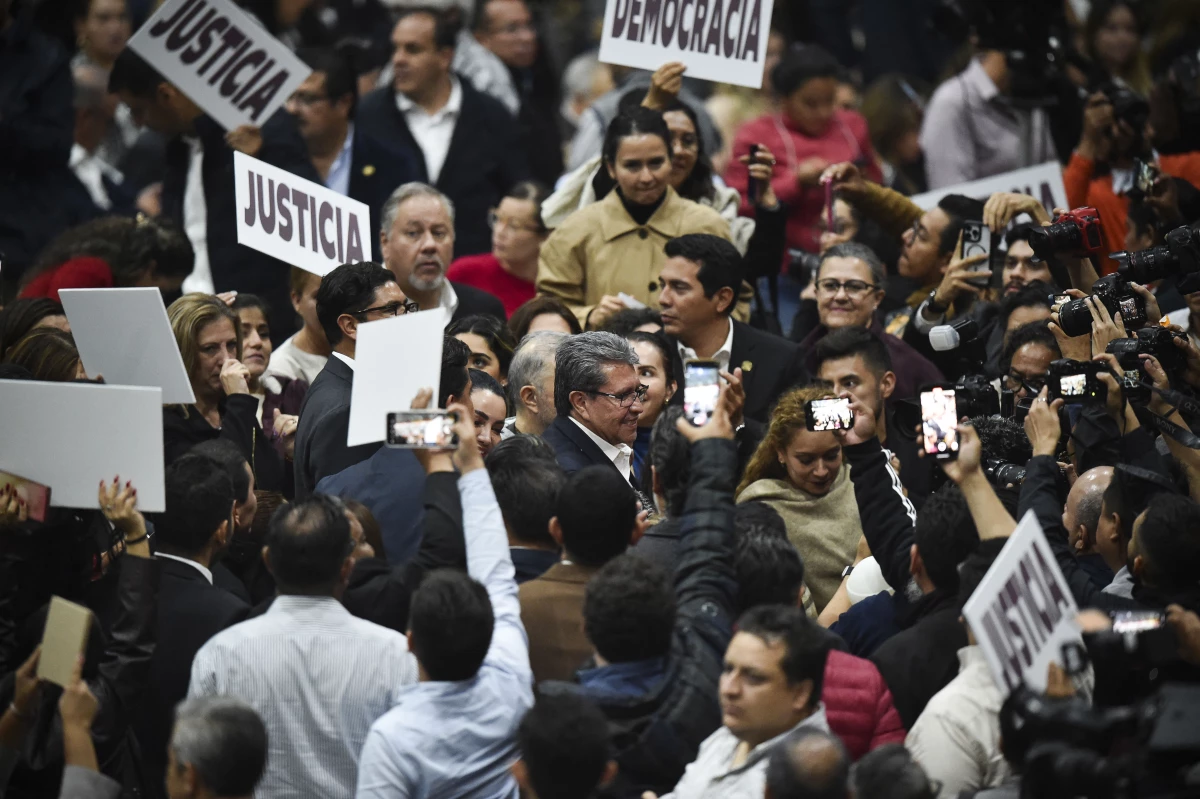 Lawmaker Ricardo Monreal celebrates after the approval of the judicial reform during a session at an alternate seat of the Mexican Congress in Mexico City's Sala de Armas, on Sept. 4.