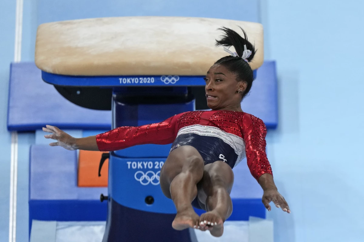 Simone Biles, of the United States, performs on the vault during the artistic gymnastics women's final at the 2020 Summer Olympics, Tuesday, July 27, 2021, in Tokyo.