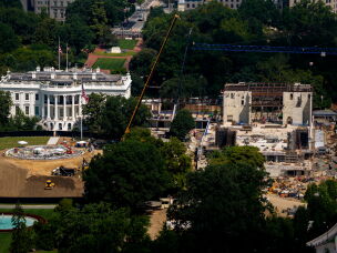 Side-by-side construction of a new helipad on the South Lawn of the White House and the East Wing ballroom, as seen in late August.