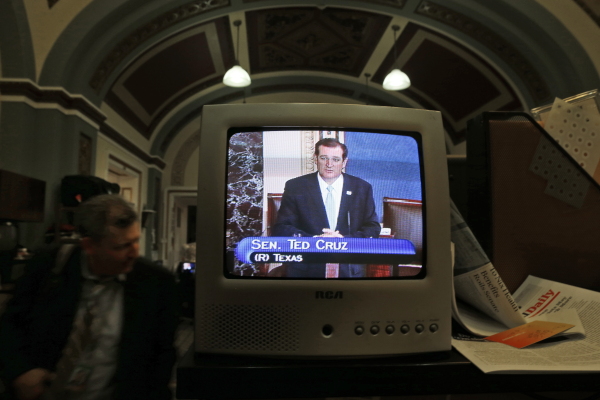 Sen. Ted Cruz, R-Texas, is seen on a television in the Senate Press Gallery as he speaks during a filibuster on the Senate floor on Sept. 24, 2013. Cruz held the Senate floor for more than 21 hours, railing against Obamacare and memorably reading from Dr. Seuss' “Green Eggs and Ham.”