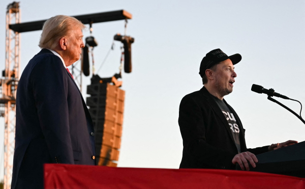 Former President Donald Trump and supporter Elon Musk, seen here at a rally in Butler, Pa., earlier this month, have helped spread the baseless claim that noncitizens will vote in large numbers this election.