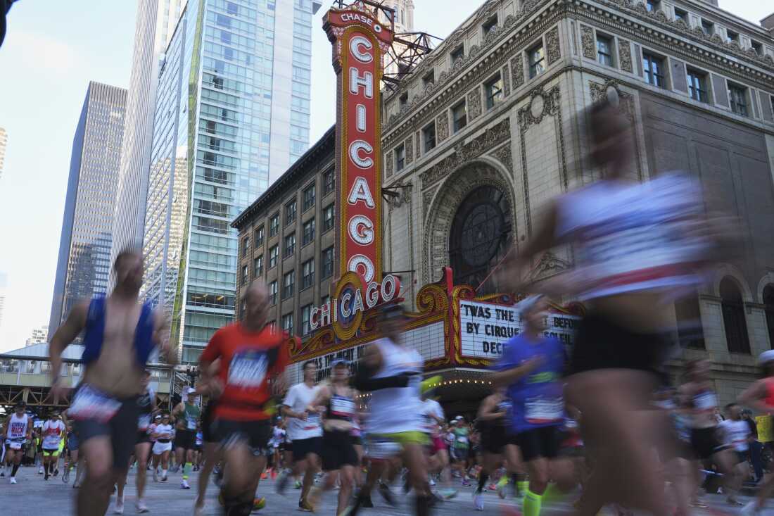 Runners participate in the Chicago Marathon on Sunday.