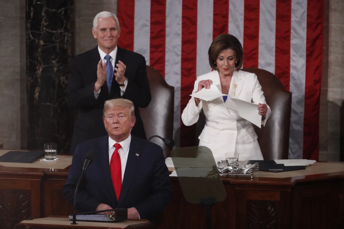 House Speaker Nancy Pelosi rips up a copy of President Trump's State of the Union address on Feb. 4, 2020.