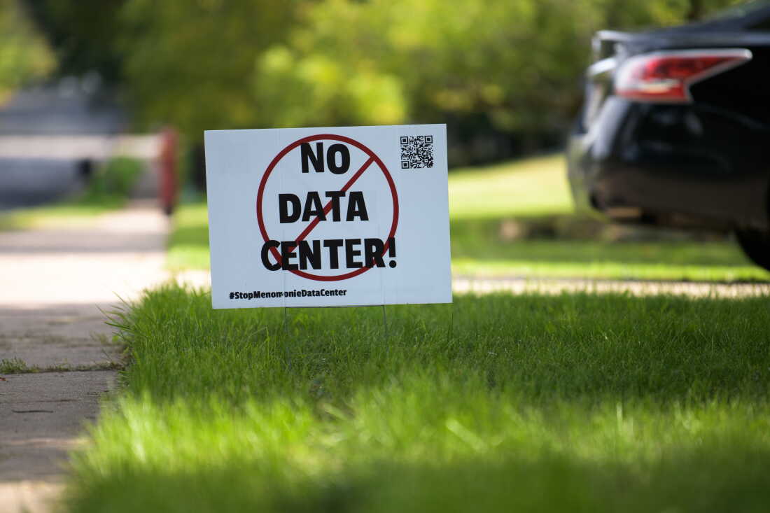 A sign opposing a data center development project stands in a neighborhood on September 24, 2026 in Menomonie, Wisconsin.