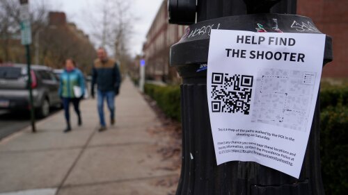 A poster seeking information about the campus shooting suspect is seen on the campus of Brown University on Dec. 17, 2025, in Providence, R.I.