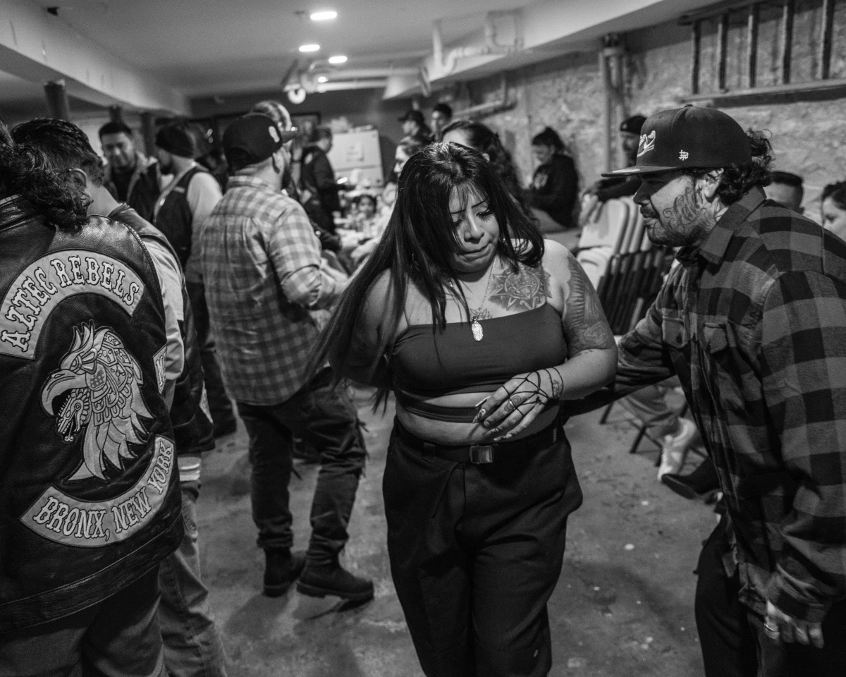Aztec Rebels dance cumbia with their loved ones at the Thanksgiving party.