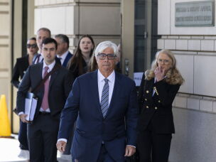 WASHINGTON, DC - OCTOBER 08: Lawyer for CNN, MS Now and Politico Ted Boutrous leaves the E. Barrett Prettyman United States Court House on October 08, 2026 in Washington, DC.
