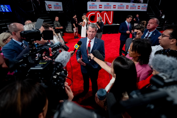 Georgia Gov. Brian Kemp speaks to reporters ahead of a CNN Presidential Debate on June 27, 2024, in Atlanta.