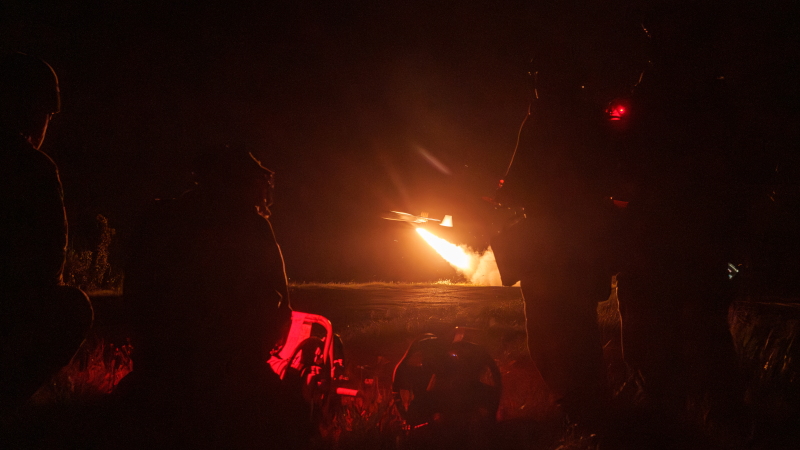 Soldiers form the First Center of Unmanned Systems launch a long/middle strike drones in undisclosed location in Ukraine on May 21, 2026.