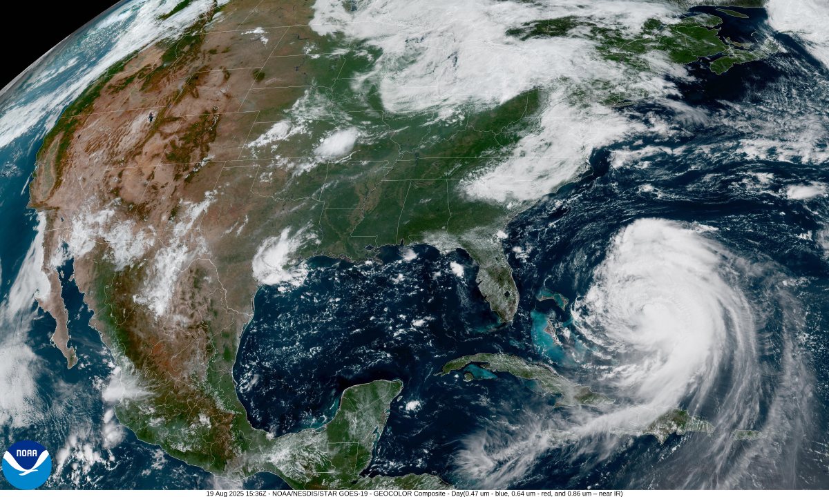 A satellite image captured late Tuesday morning ET shows Hurricane Erin moving to the northwest over the Atlantic Ocean. Forecasters predict the large storm will follow a path curving toward and then away from the U.S. East Coast in the coming days.