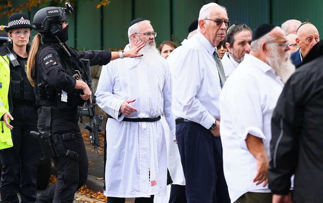 2 killed in Manchester synagogue attack on Jewish holiday, suspect named : NPR