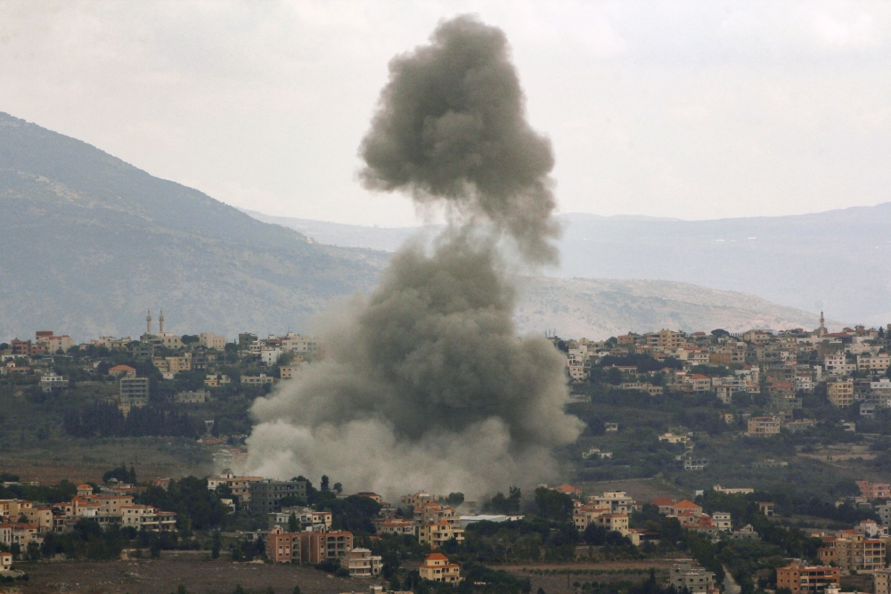 Smoke billows from the site of an Israeli airstrike in the Lebanese village of Khiam, near the Lebanon-Israel border, on Monday. (AFP via Getty Images)