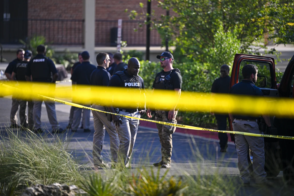 Police investigate the scene of a shooting near the student union at Florida State University on April 17, 2025 in Tallahassee, Florida. Two people were killed and five injured in the attack. Florida's attorney general is now investigating OpenAI because the alleged shooter used ChatGPT to help plan the attack.