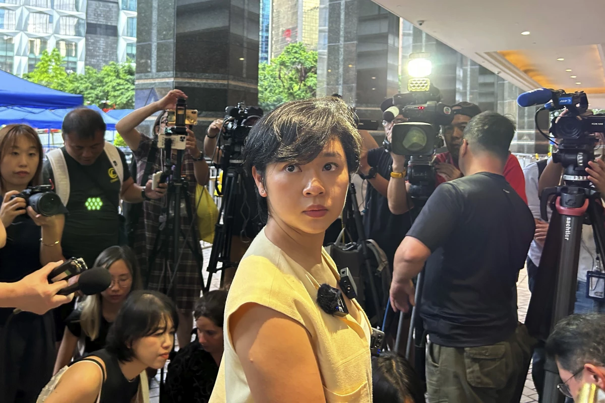 Selina Cheng, newly elected chairperson of the Hong Kong Journalists Association, speaks to media in Hong Kong on Wednesday. Cheng said she lost her job at The Wall Street Journal after she refused her supervisor’s request to withdraw from the election for the leadership post.