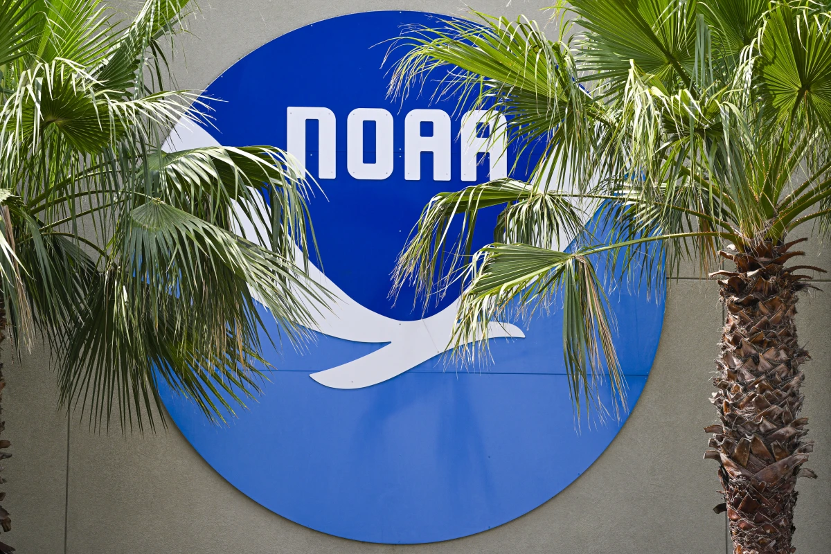 A National Oceanic and Atmospheric Administration's (NOAA) logo is seen at the Aircraft Operations Center in Lakeland, Florida, on May 6, 2025. The Trump administration fired roughly 600 NOAA employees in its purge of probationary workers earlier this year.