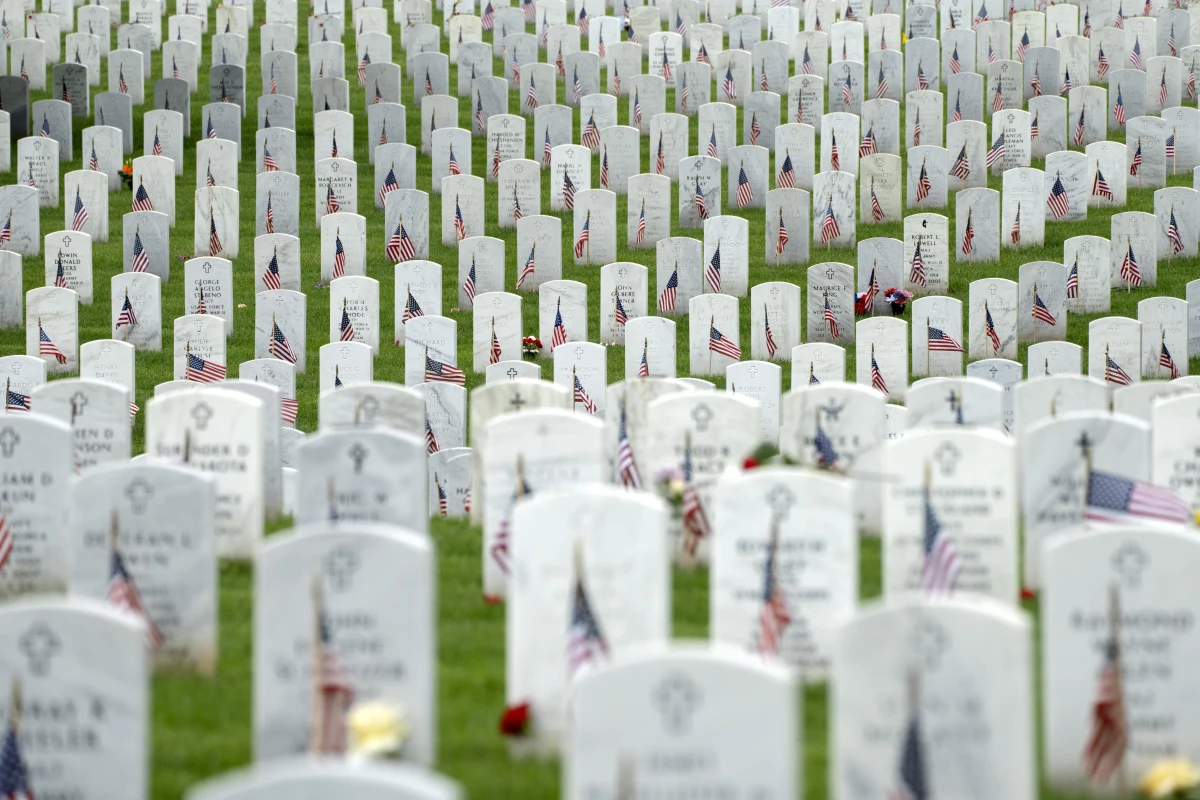 Graves with flags for Memorial Day are seen in Section 60 of Arlington National Cemetery, in Arlington, Va., Monday, May 27, 2024. (AP Photo/Jacquelyn Martin)