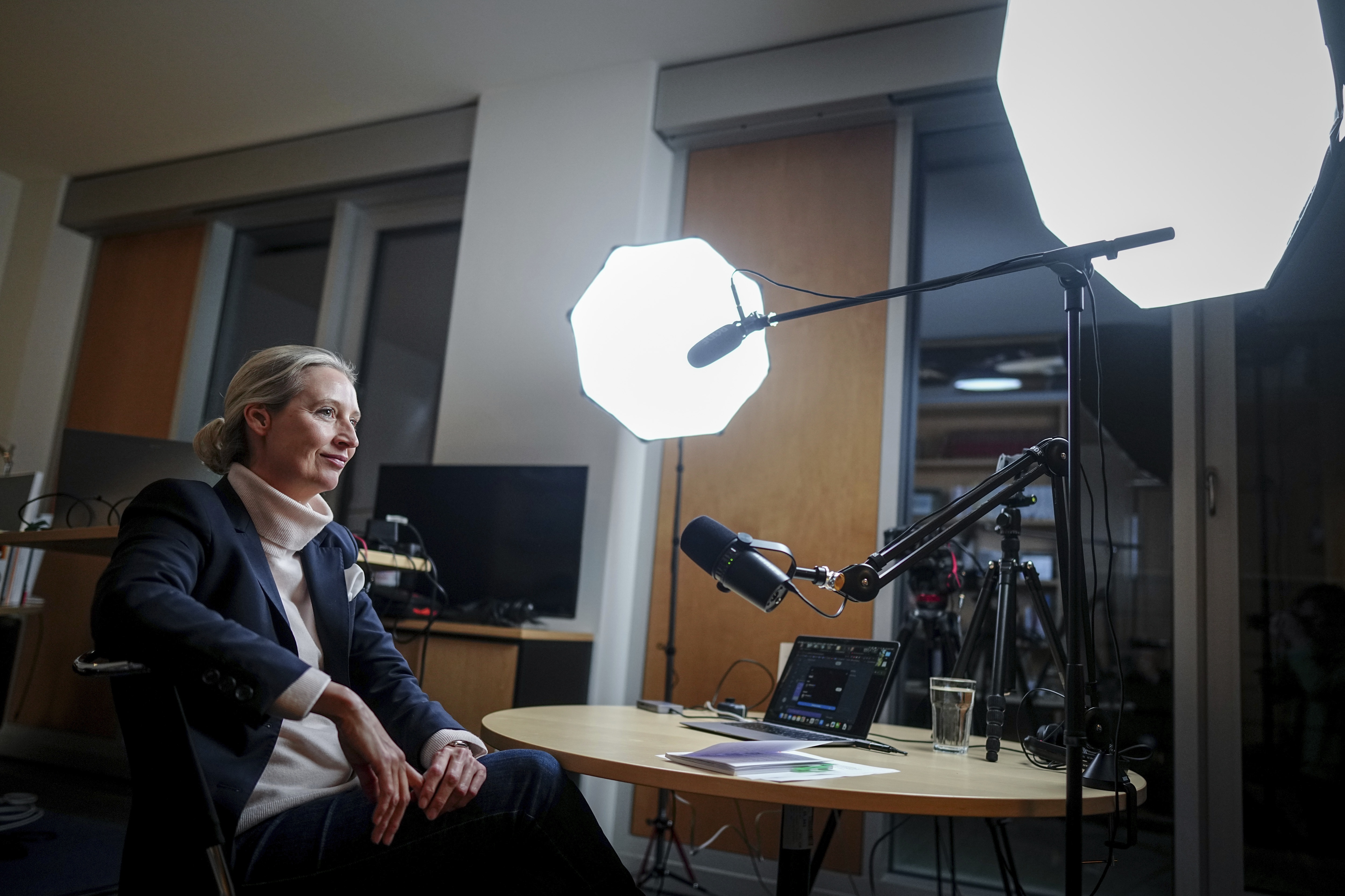 Alice Weidel, parliamentary group leader, party chair and candidate for chancellor of Germany's AfD, prepares for a live X interview with U.S. billionaire Elon Musk in her office in the Jakob Kaiser House in Berlin, on Thursday. (DPA-Pool/AP)