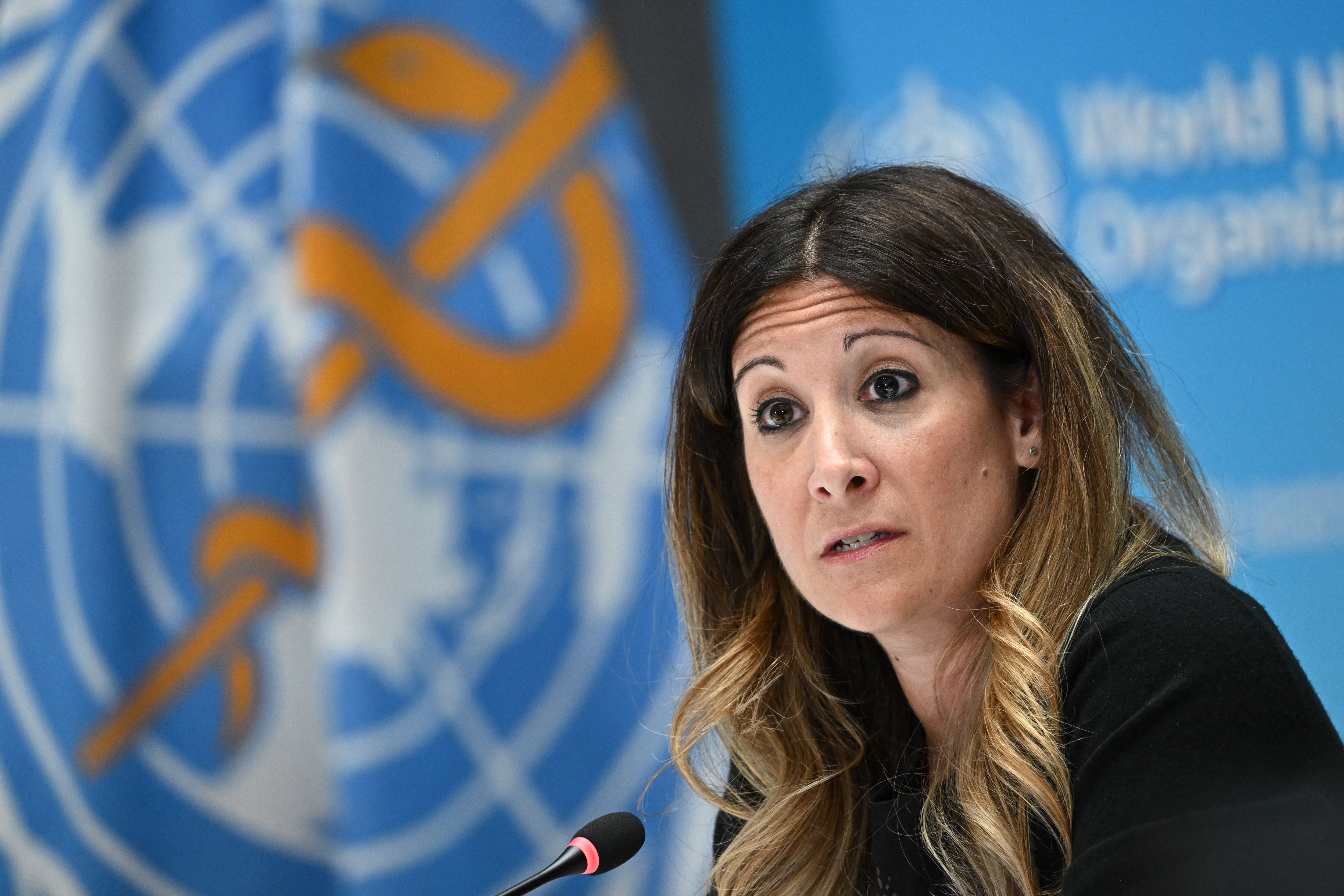 Maria Van Kerkhove speaks at a World Health Organization press conference. The public face of WHO at over 250 briefings on COVID, she says she and her colleagues are now scrambling to respond to the "abrupt" halt in most U.S. foreign aid.