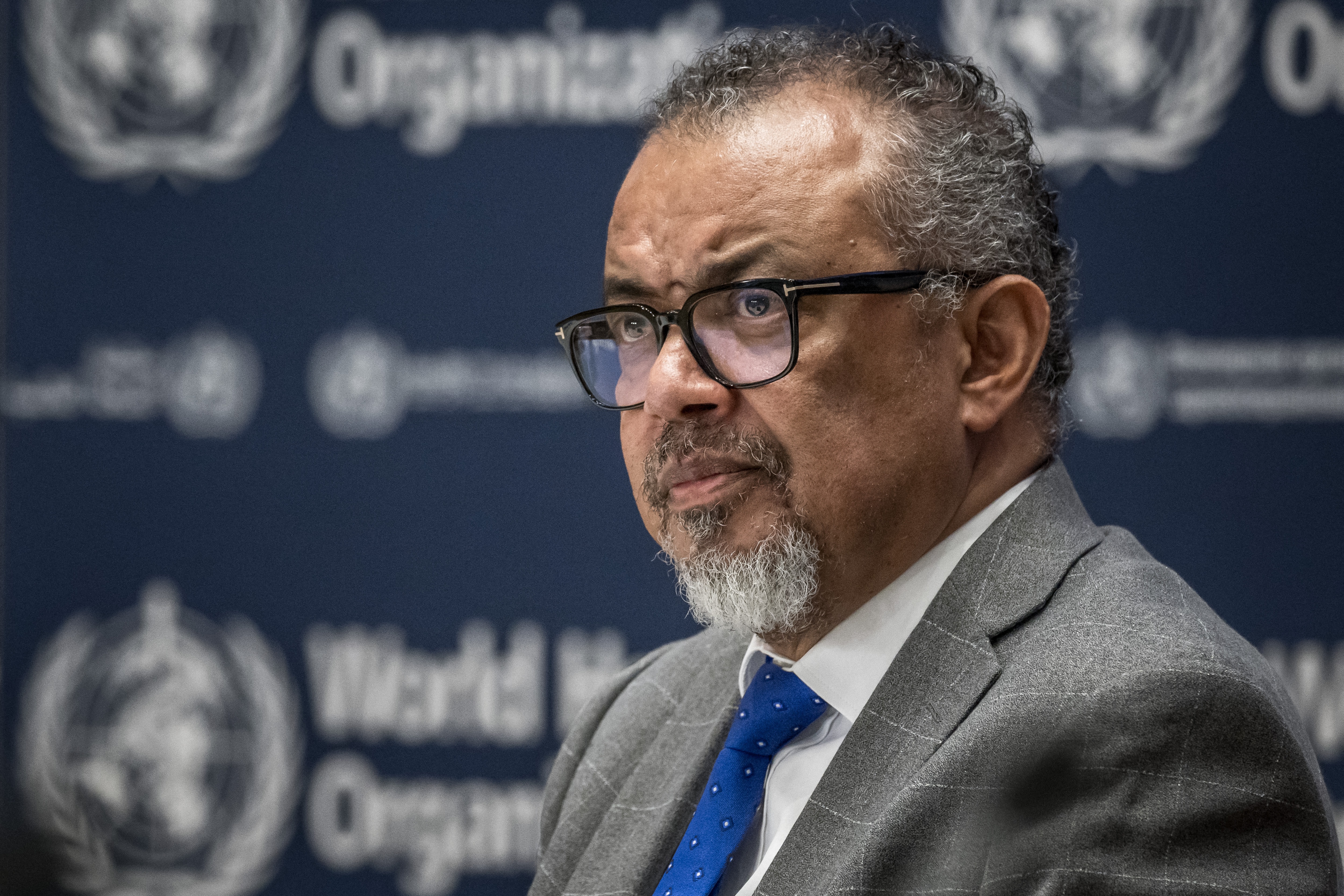 WHO Director-General Tedros Adhanom Ghebreyesus looks on during a press conference with the Association of Accredited Correspondents at the United Nations (ACANU) at the World Health Organization